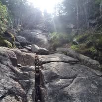 Gorgeous view of sun beaming through off one of the Adirondack Hiking trails